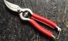 Sécateur de Jardin 18 cm - revêtement des branches en cuir ROUGE