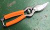 Sécateur de Jardin 18 cm - revêtement des branches en cuir ORANGE